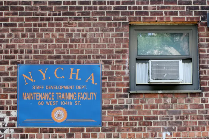 A sign for a NYCHA maintenance training facility.
